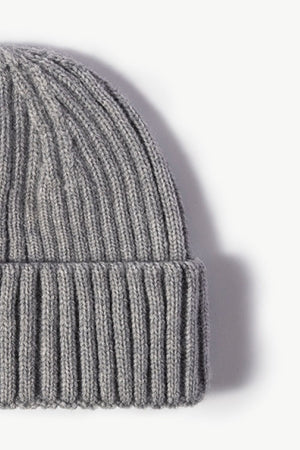 Gray chunky ribbed knit beanie with a folded cuff, acrylic material.