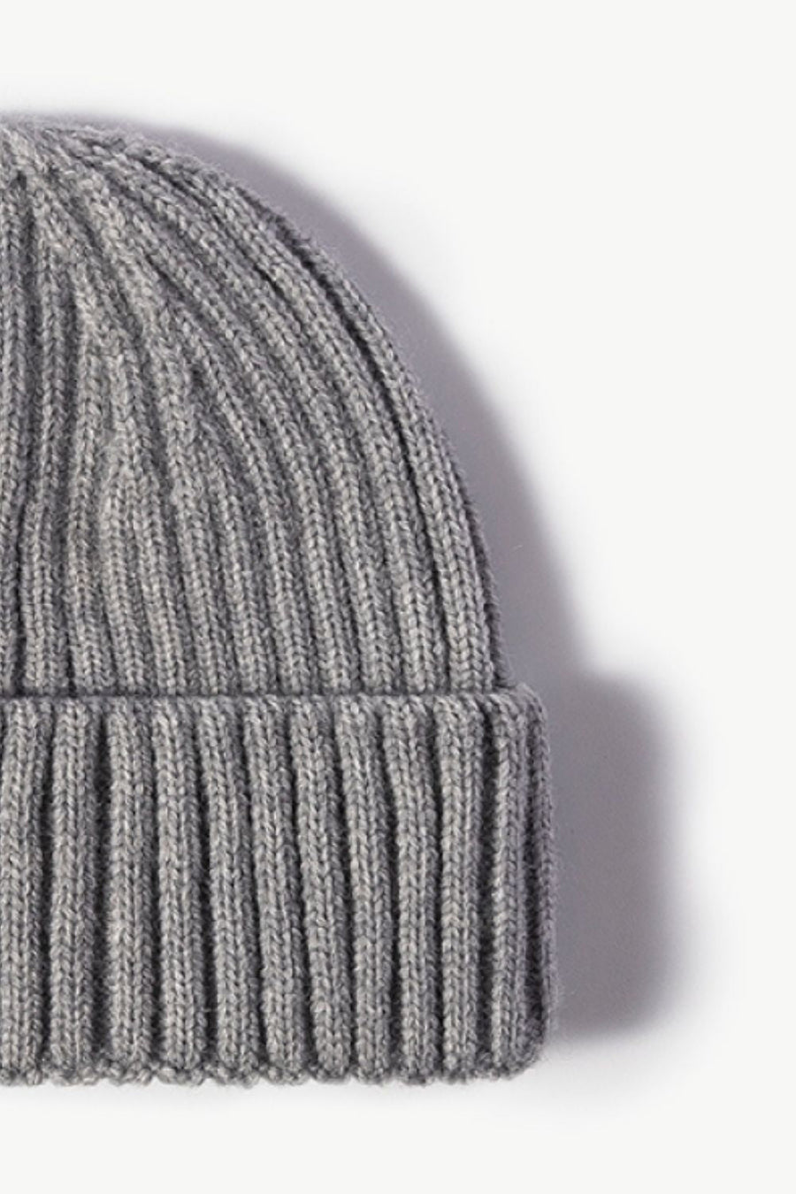Gray chunky ribbed knit beanie with a folded cuff, acrylic material.