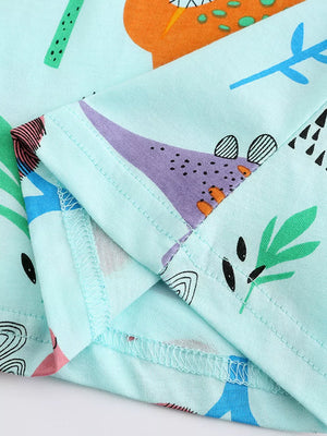 Light blue cotton t-shirt with a playful dinosaur and abstract pattern.
