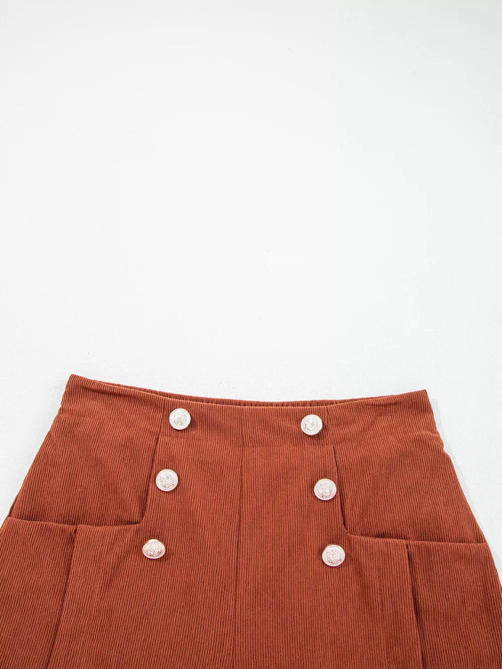 shorts in rust with buttoned and mini