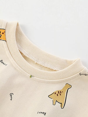 Beige cotton crew neck sweatshirt with dinosaur print and text details.