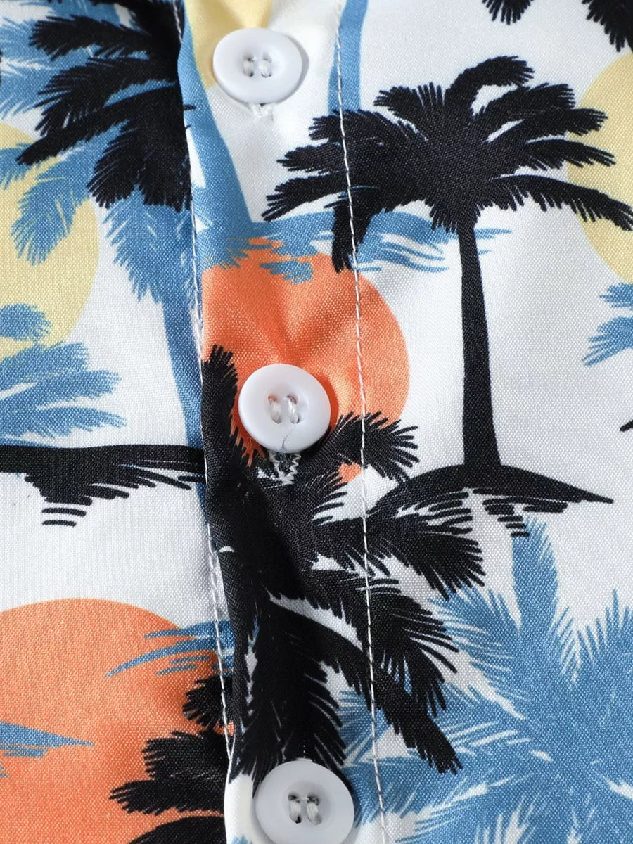 Baby cotton shirt with multicolor palm tree and sunset print, featuring white buttons.