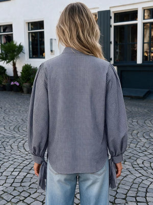 navy blue button-up shirt with button cuffs and long sleeve