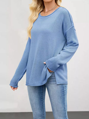 100% polyester Care instructions: Machine wash cold crewneck sweater in Red with loose silhouette
