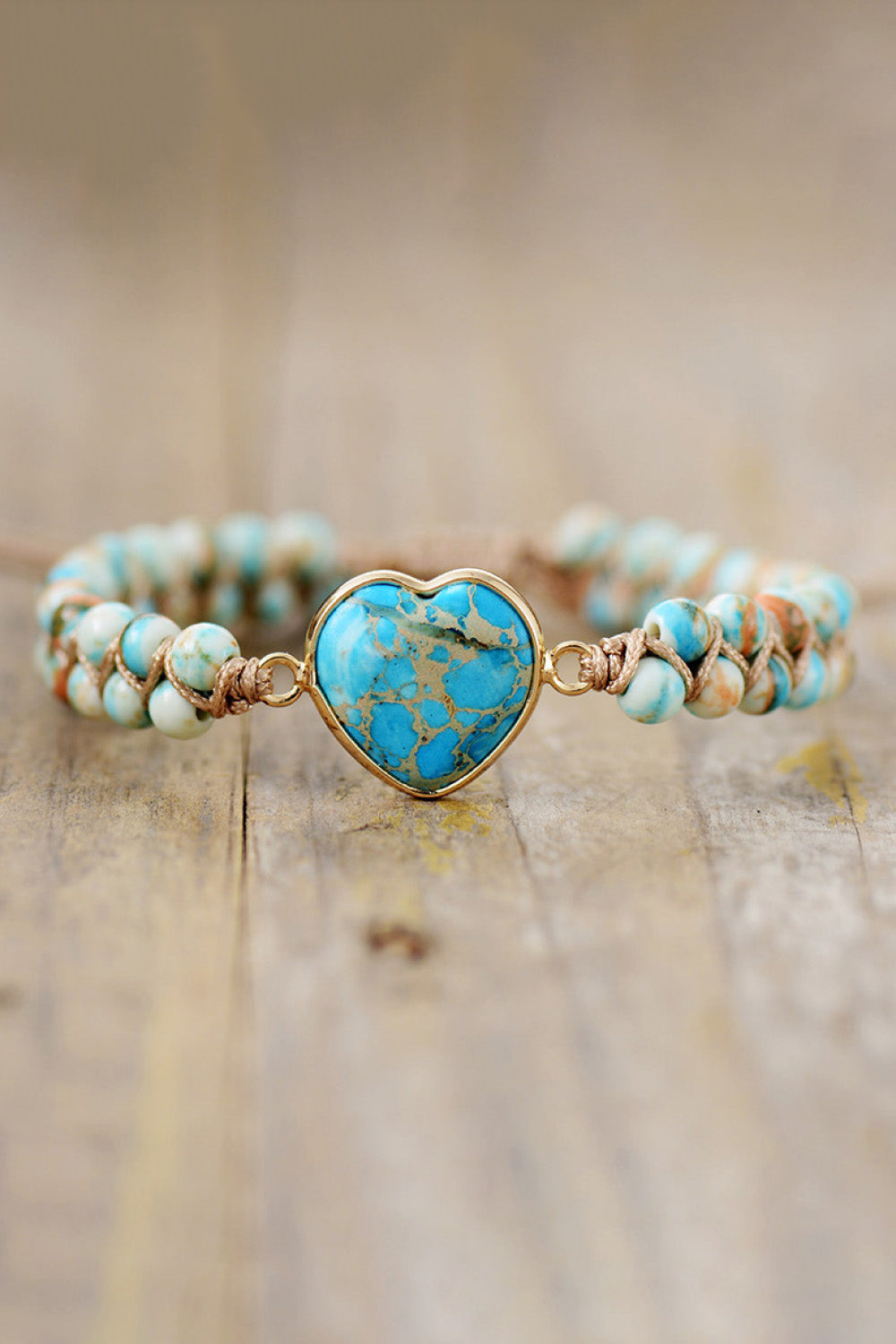Braided bracelet with sky blue heart stone and beaded band