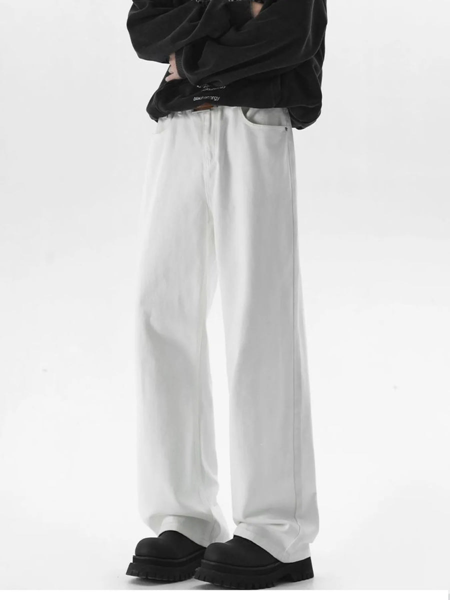 White wide-leg jeans with a comfort fit, cotton blend material, and a relaxed silhouette.