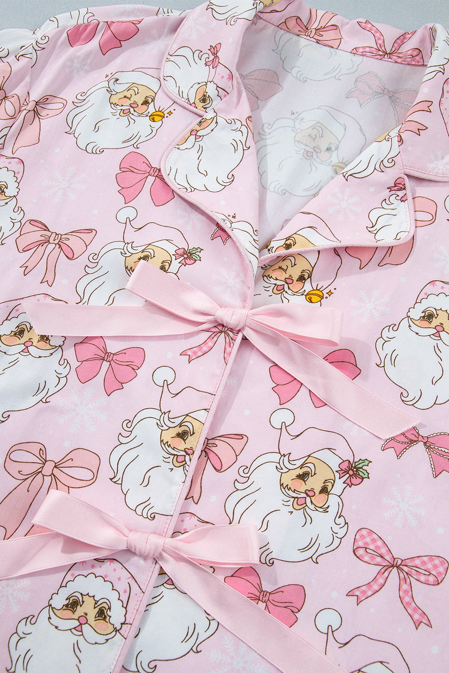 pajama set featuring Santa print in white with 100% viscose Care instructions: Machine wash cold texture