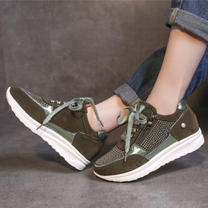 Khaki rhinestone embellished lace-up sneakers with a chunky sole and side zipper detail.
