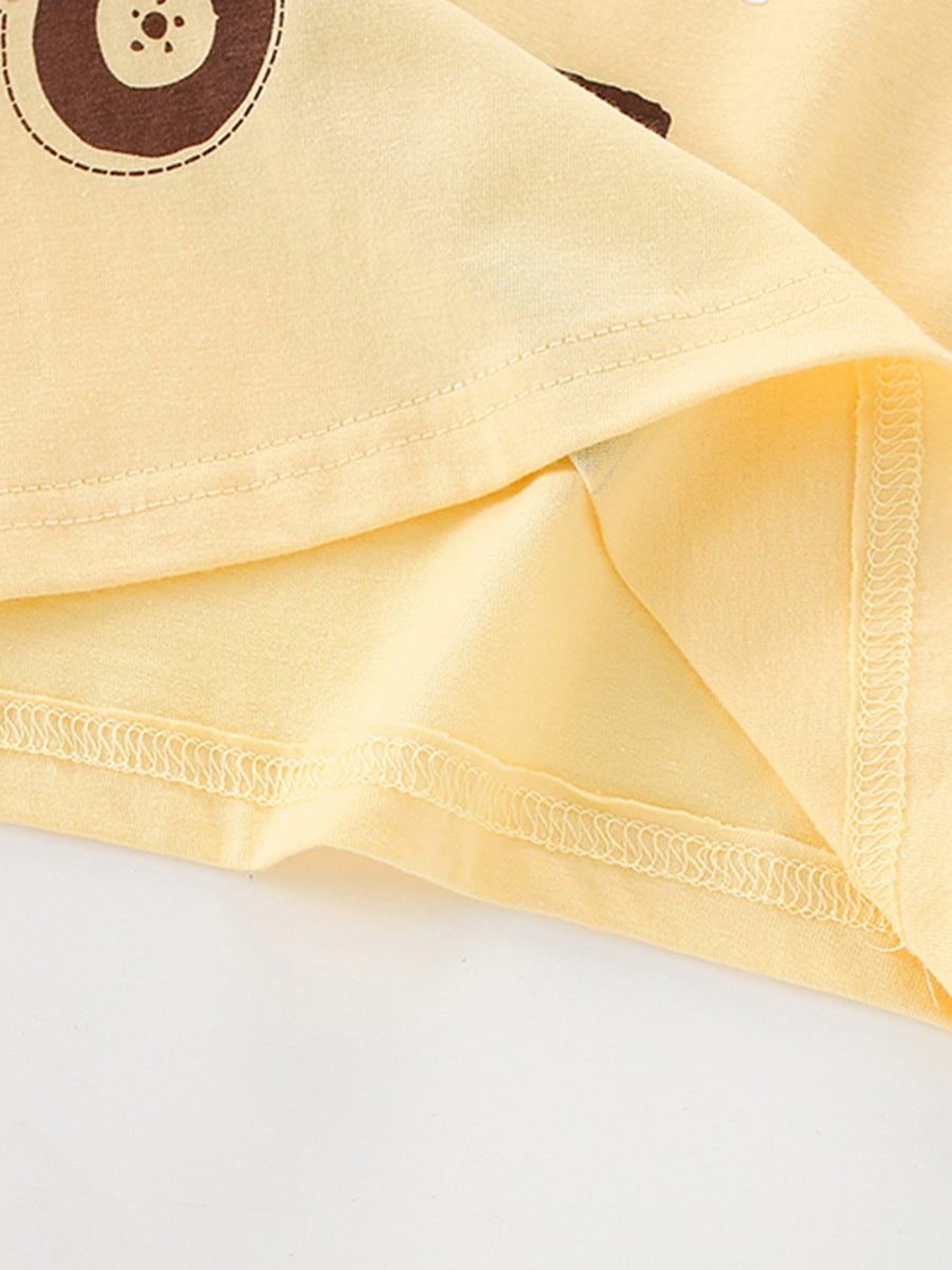 Yellow cotton toddler t-shirt with lion graphic detail and reinforced seams.