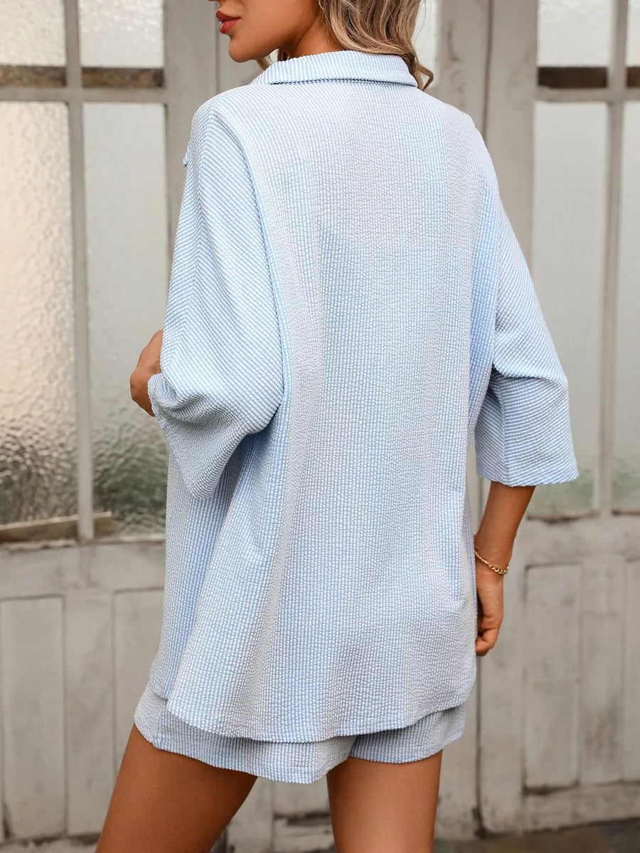 Light blue textured two-piece set with classic collar shirt and shorts.