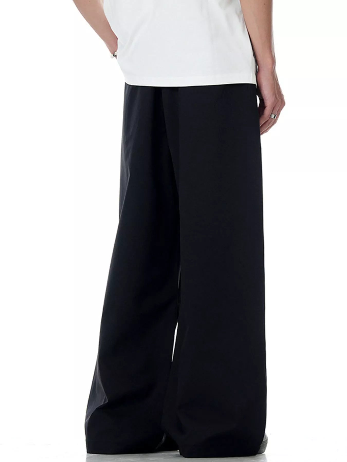 Men's black wide-leg drawstring jogger pants with a relaxed fit.