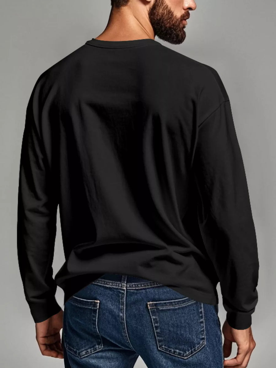 Black long sleeve henley t-shirt with crew neck shown from the back on a man.