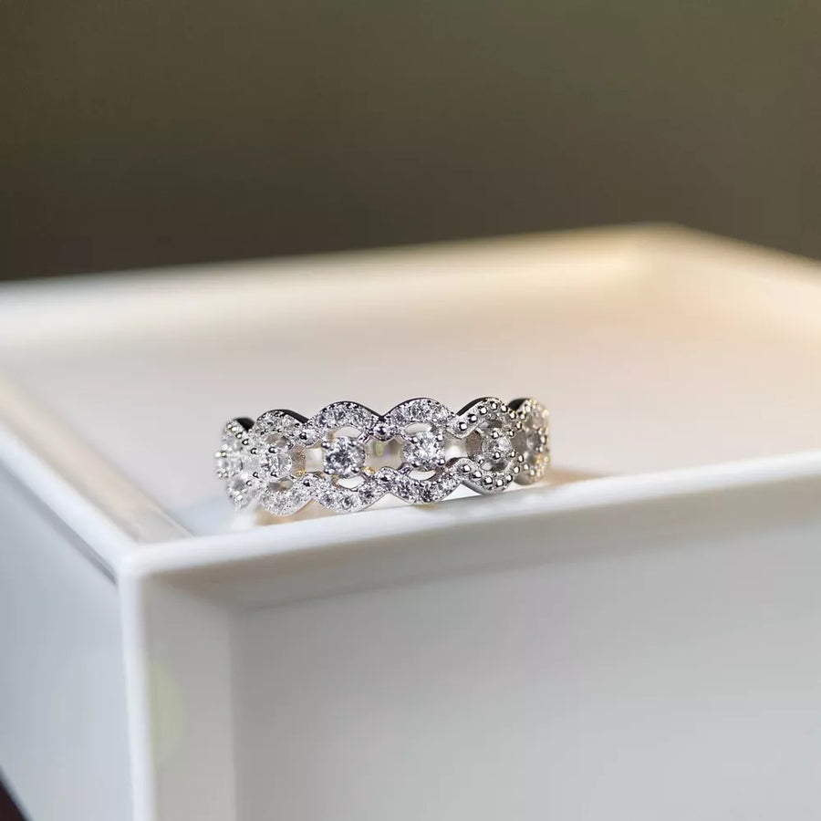 ring in clear with geometric and zircon embellishment