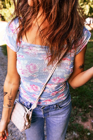 Square neck ruched floral mesh top with cap sleeves in blue and pink.