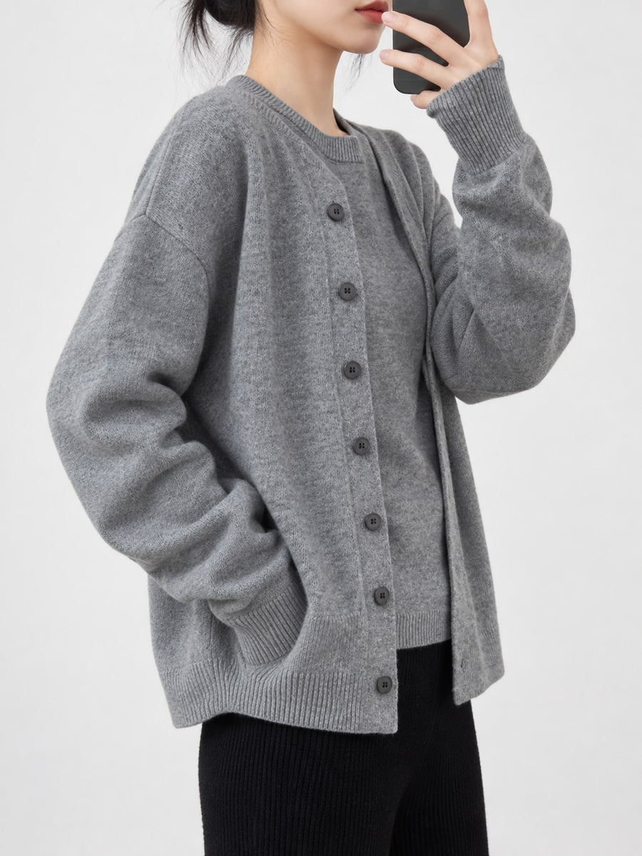 Wool content is 95% or greater cardigan in Light Oatmeal with oversized silhouette