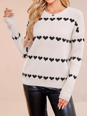 pullover sweater in Rose Red with ribbed cuffs and hip-length