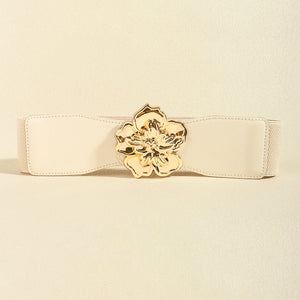 Ivory stretch cincher belt with gold floral buckle detail