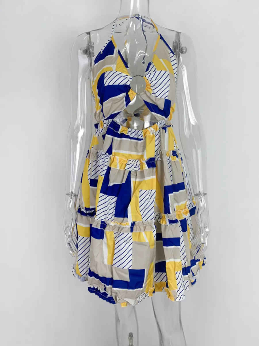 Abstract print halter mini dress with cutout detail and tiered ruffle skirt.
