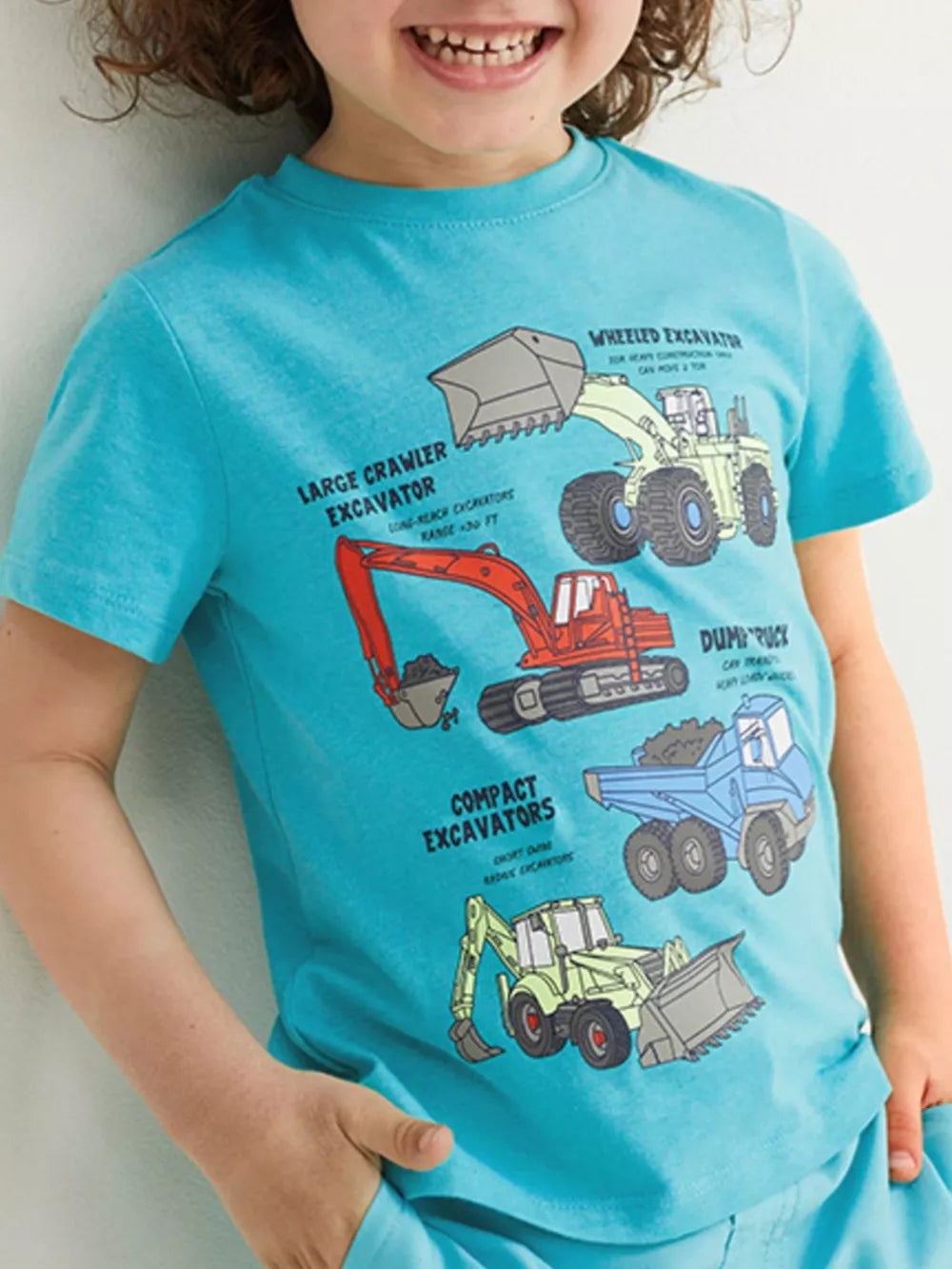 Turquoise cotton blend t-shirt with construction vehicle graphics and text.
