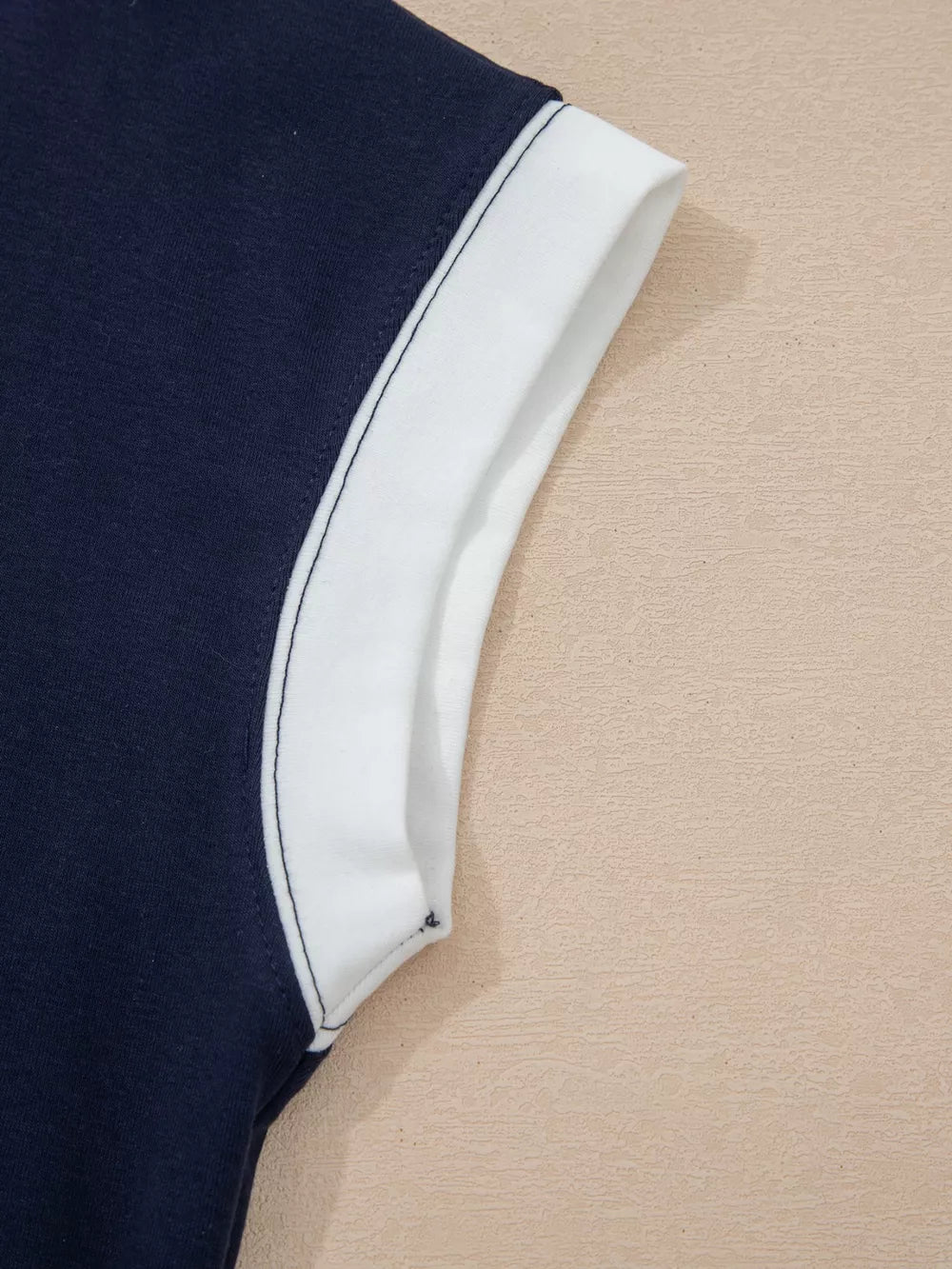 Navy and white colorblock mini dress sleeve detail