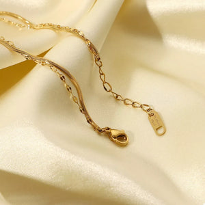 18K Gold-Plated, Stainless Steel, Zircon Care instructions: Avoid wearing during bracelet in Gold with fitted silhouette