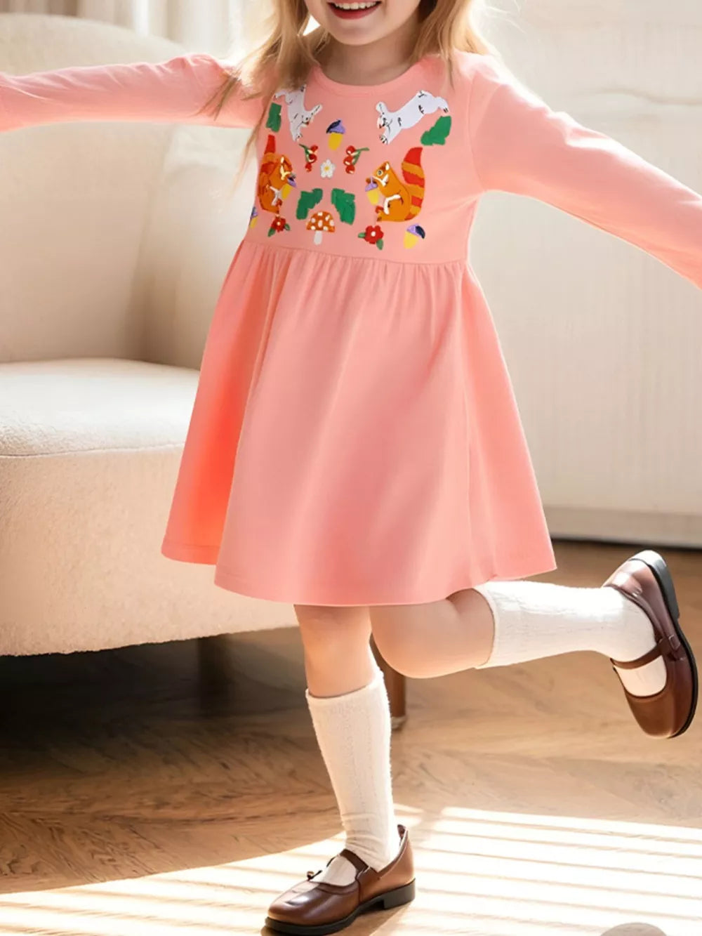 Playful animal embroidered toddler dress in cotton.