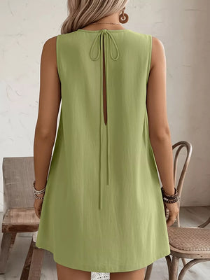 Yellow-Green sleeveless dress with back tie detail and keyhole cutout.