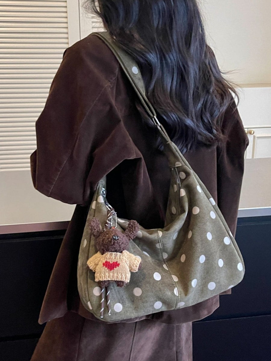 handbag in olive green with polka dot and zipper closure