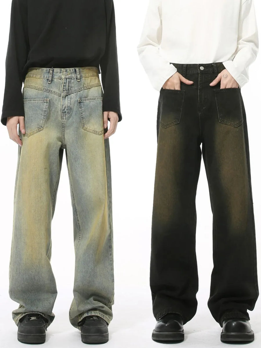 Distressed denim jeans in dark and medium wash, wide leg, cotton, casual style.
