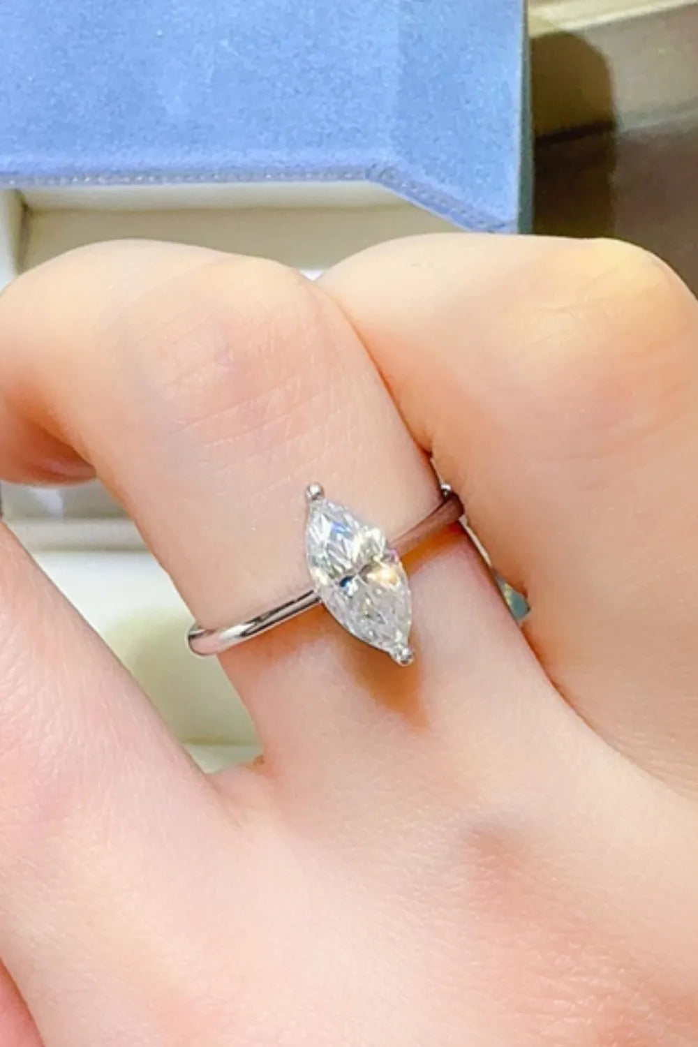 Marquise cut sterling silver solitaire ring with a clear stone.