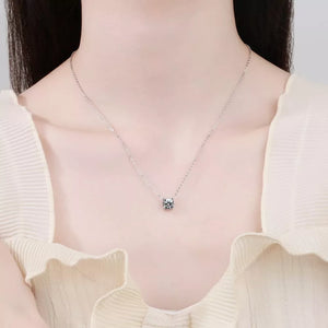 Radiant moissanite pendant necklace in sterling silver with a delicate chain.