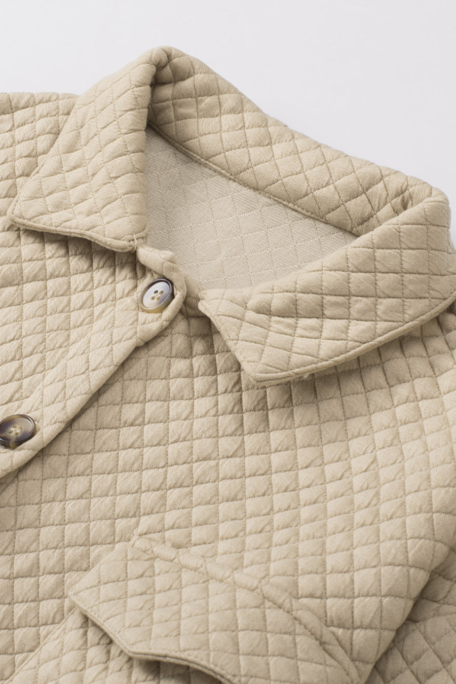 Quilted tan overshirt with button front and collar detail