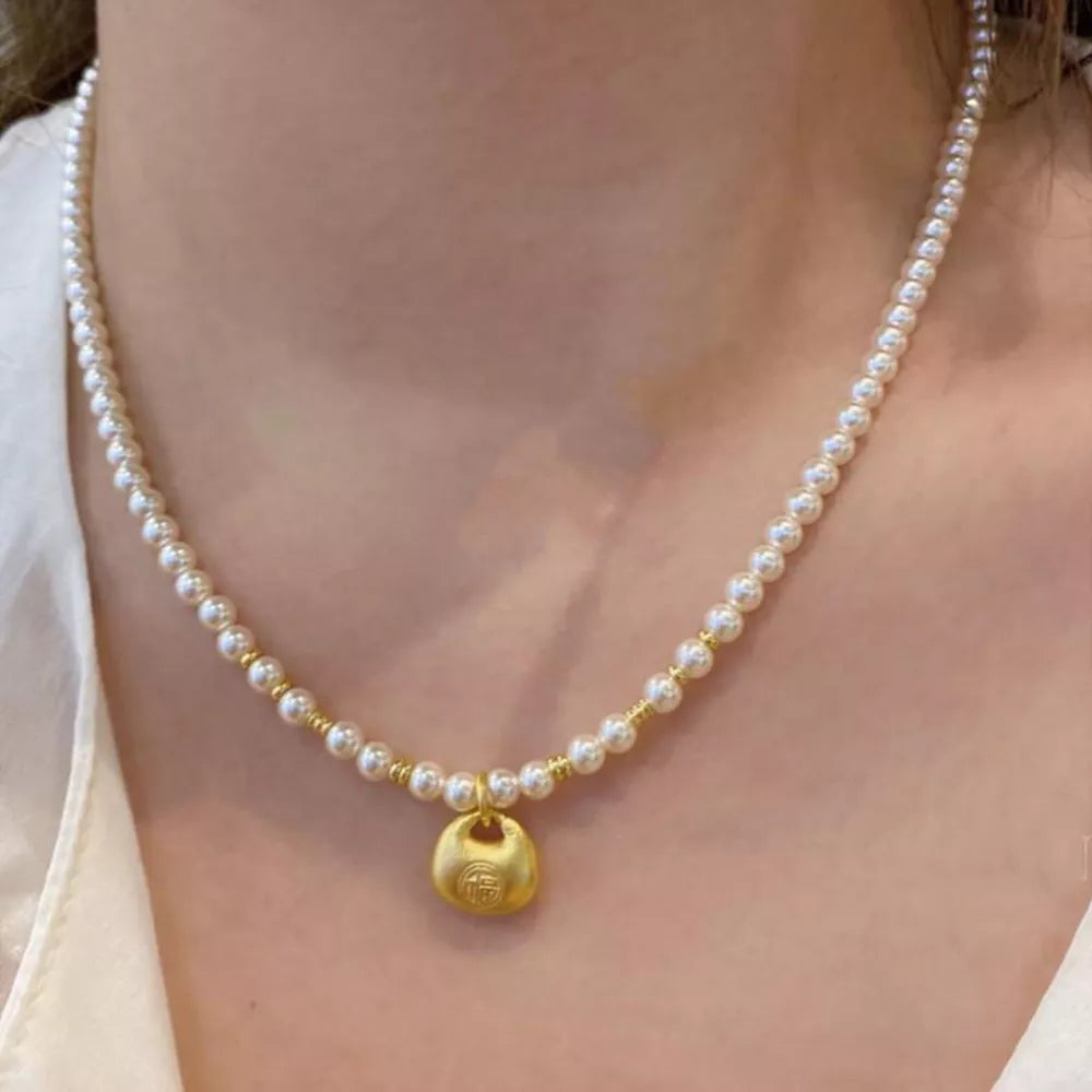 necklace in ivory featuring pearl accents and n/a fit