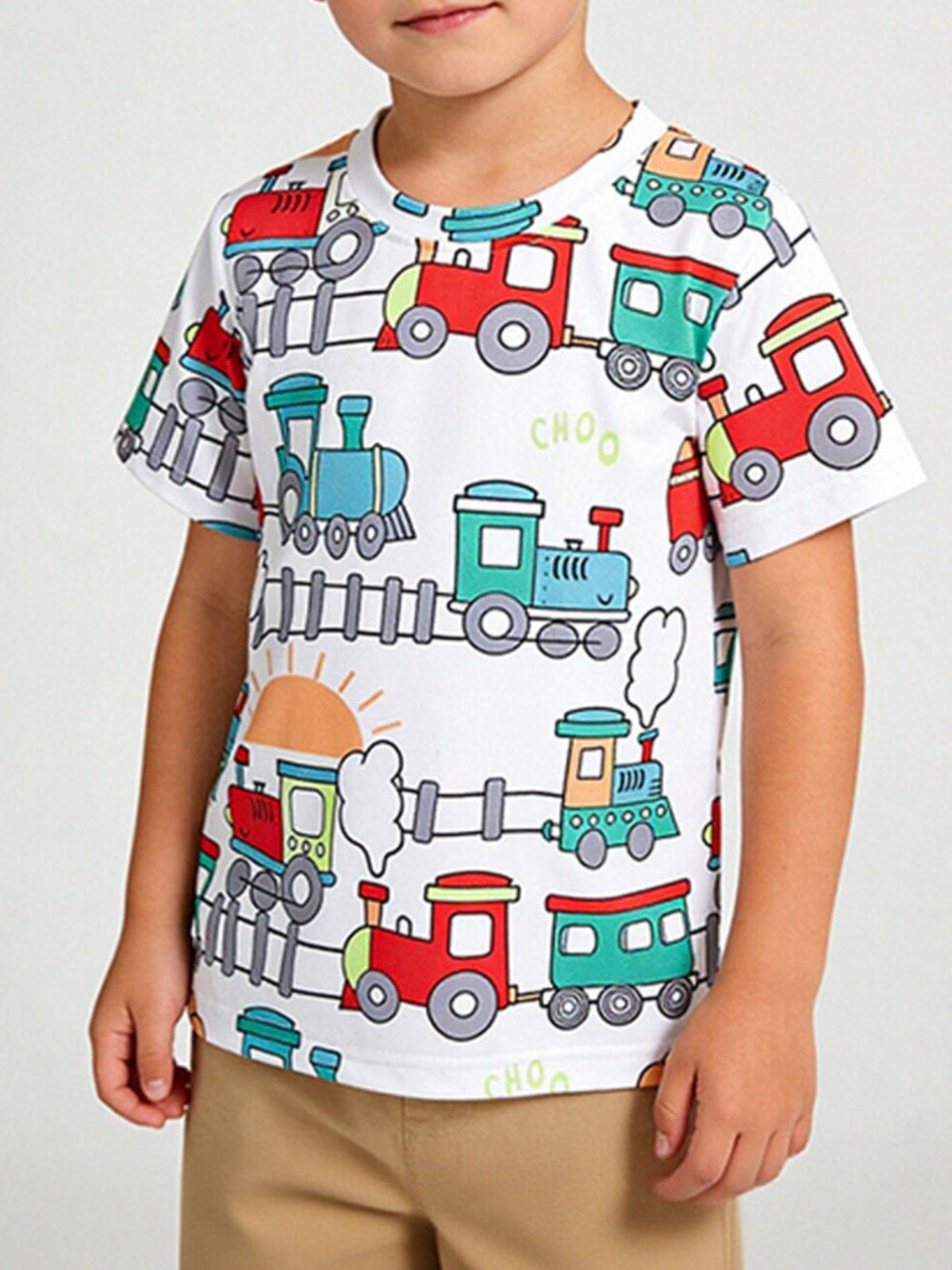 White toddler t-shirt with a playful all-over train print and short sleeves.