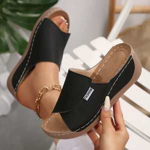 Black casual chic open-toe wedge sandals with white stitching detail and a "Fashion" label.