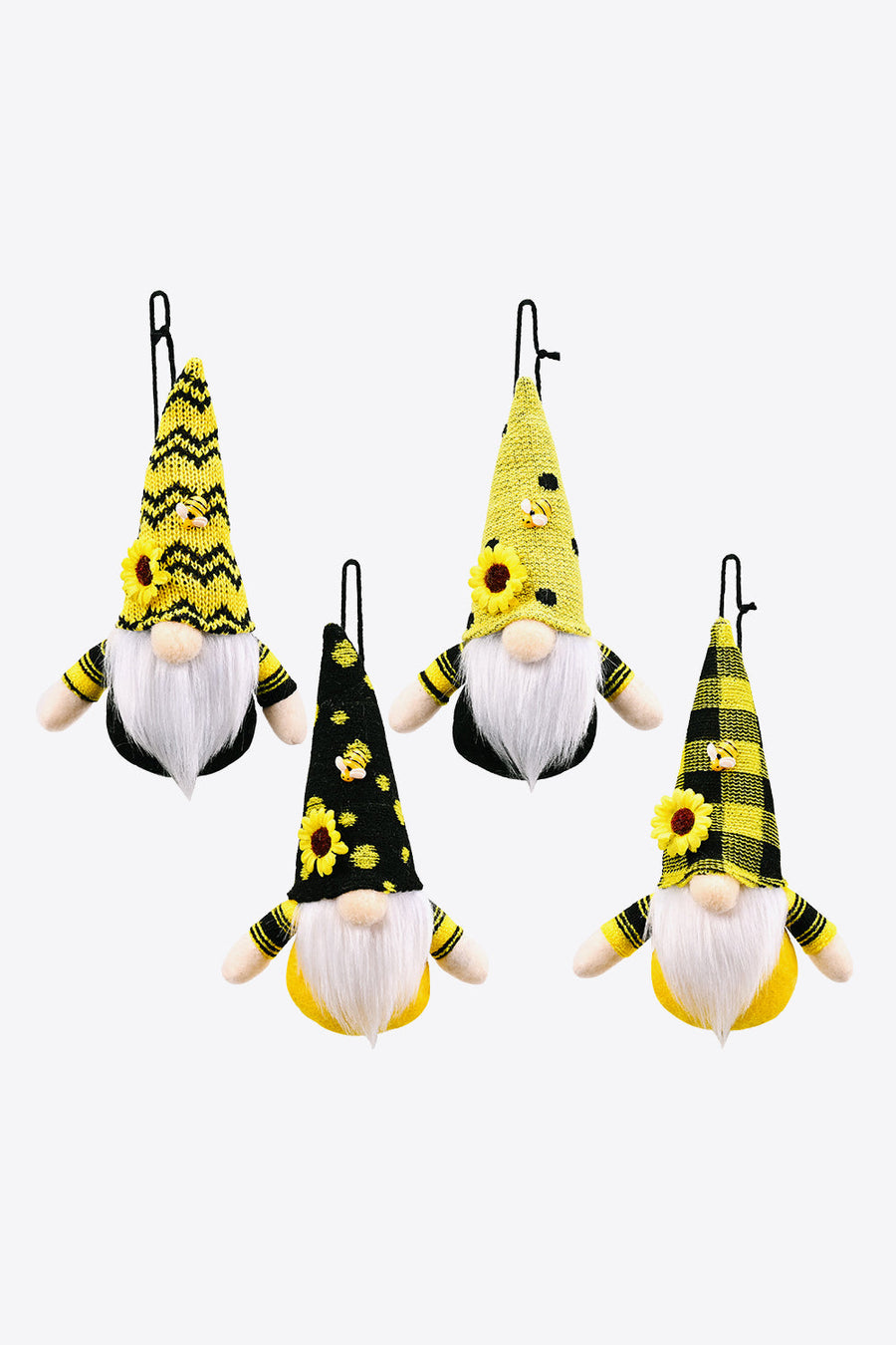 Bee-themed gnome ornaments in yellow with sunflowers and bumblebee patterns.