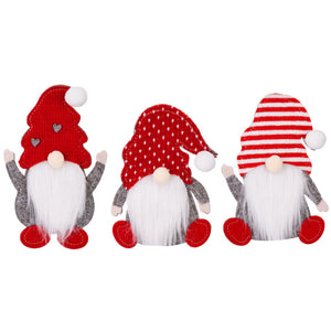 Festive gnome cutlery accoutrements in red with white accents, perfect for holiday table settings.