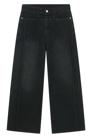 Dark wash cotton denim jeans with wide legs and vertical seams.