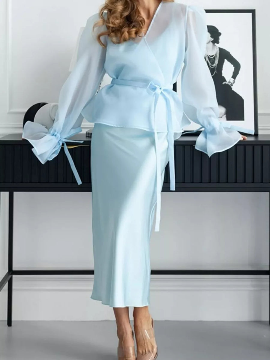 two-piece set in Brown with belted and midi