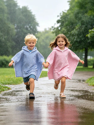 white poncho with striped and hooded