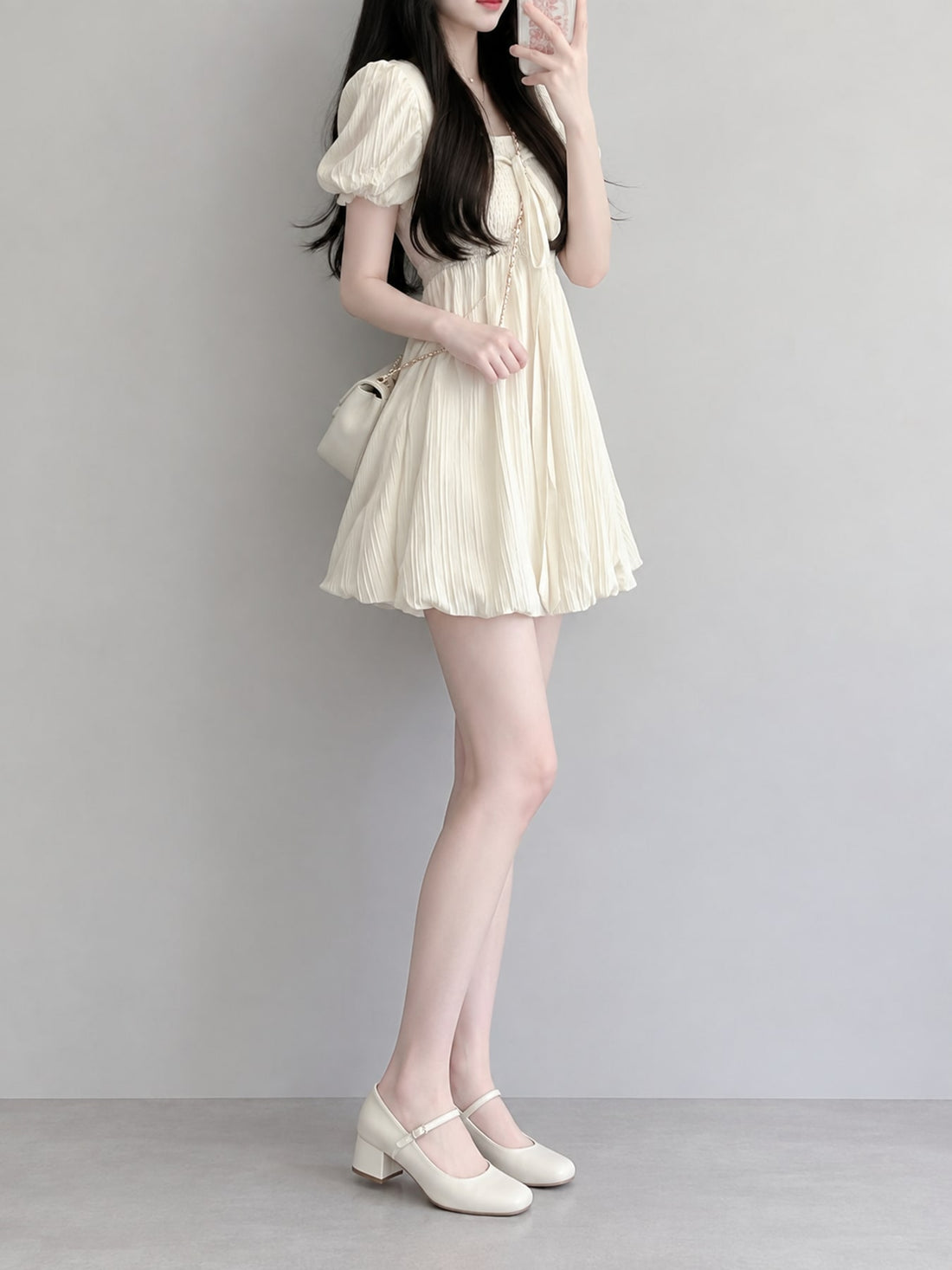 Polyester (70% to less than 80%) and spandex (less than 30%) mini dress in Cream with A-line silhouette