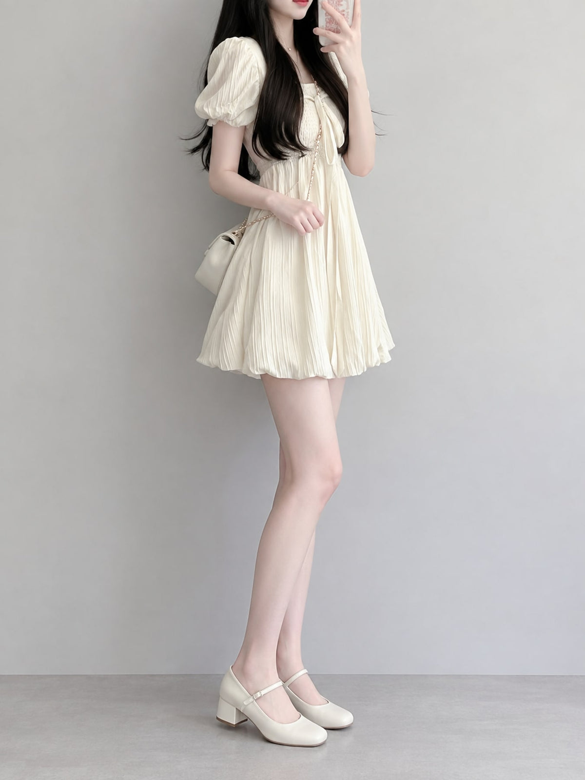 Polyester (70% to less than 80%) and spandex (less than 30%) mini dress in Cream with A-line silhouette