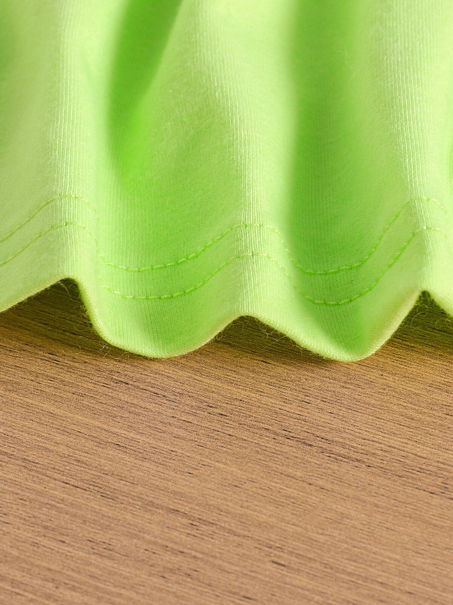 Light Green cotton blend toddler crop top hem detail with double stitching.