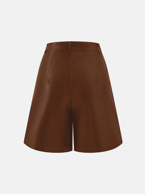 Brown vegan leather Bermuda shorts with buttoned waist and tailored fit