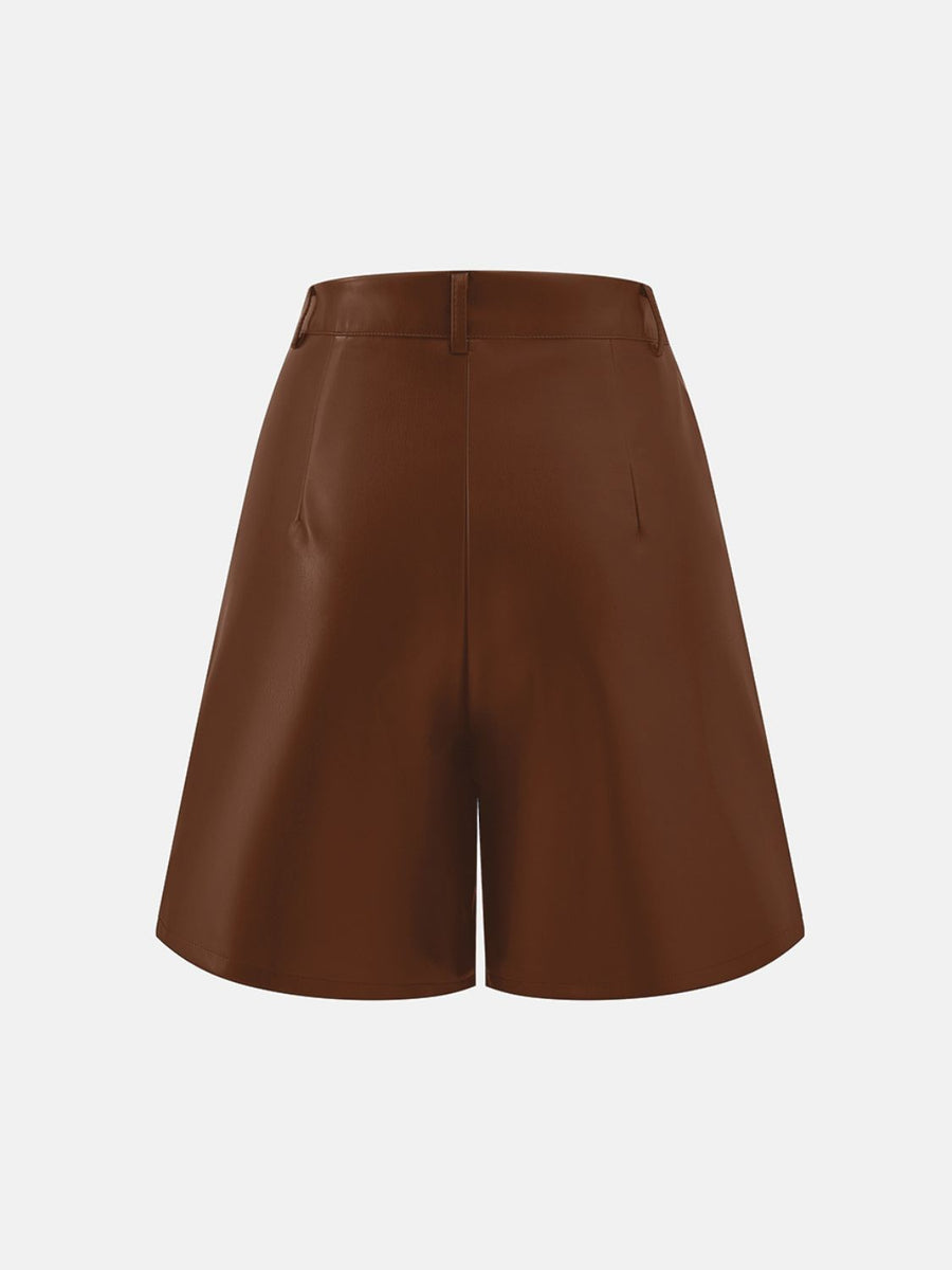Brown vegan leather Bermuda shorts with buttoned waist and tailored fit