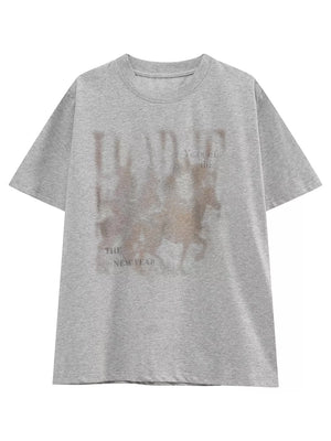 Grey cotton blend t-shirt with vintage graphic print and text.