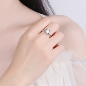 925 sterling silver,Moissanite Carat weight: 1ct Care instructions: Avoid wearin ring in clear with wrap silhouette