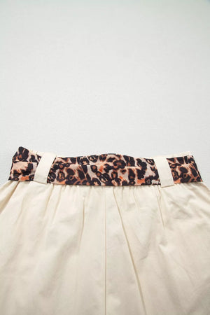 Cream skirt with leopard print tie waist and cream belt loops