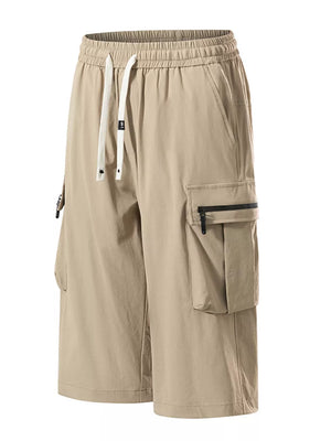 Khaki cargo shorts with drawstring waist and zippered pockets.