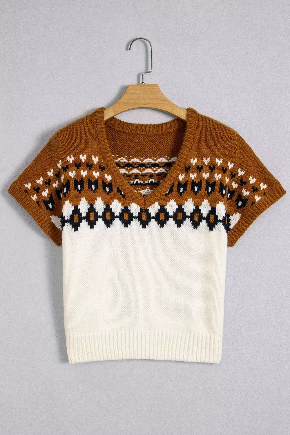 black v-neck sweater with ribbed hem and short sleeve